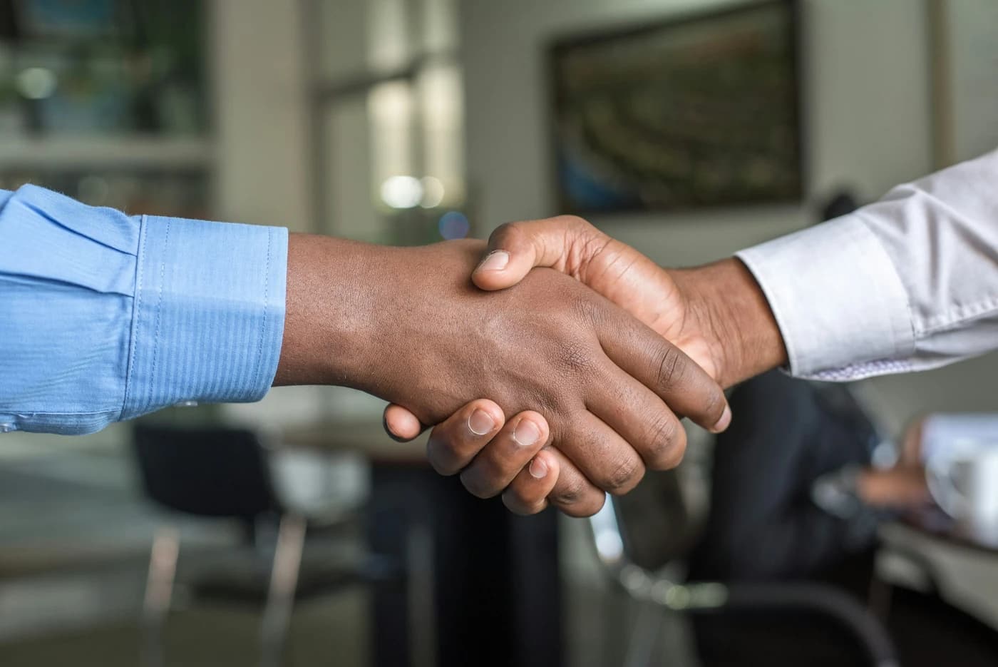 Loan officer and Realtor shaking hands