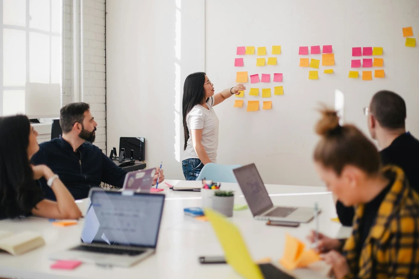 Team planning a monthly marketing calendar